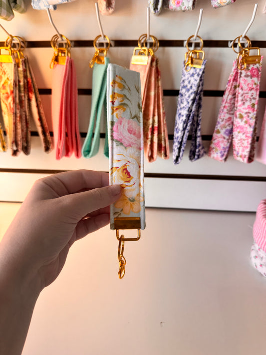 Mint Flowers Wristlet