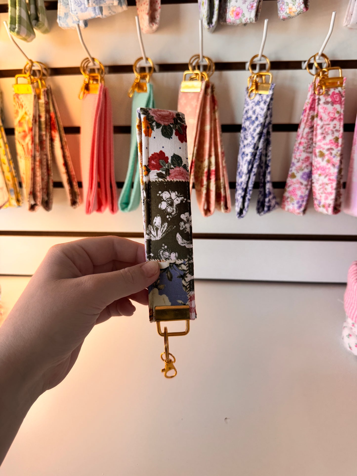 Patchy Floral Wristlet