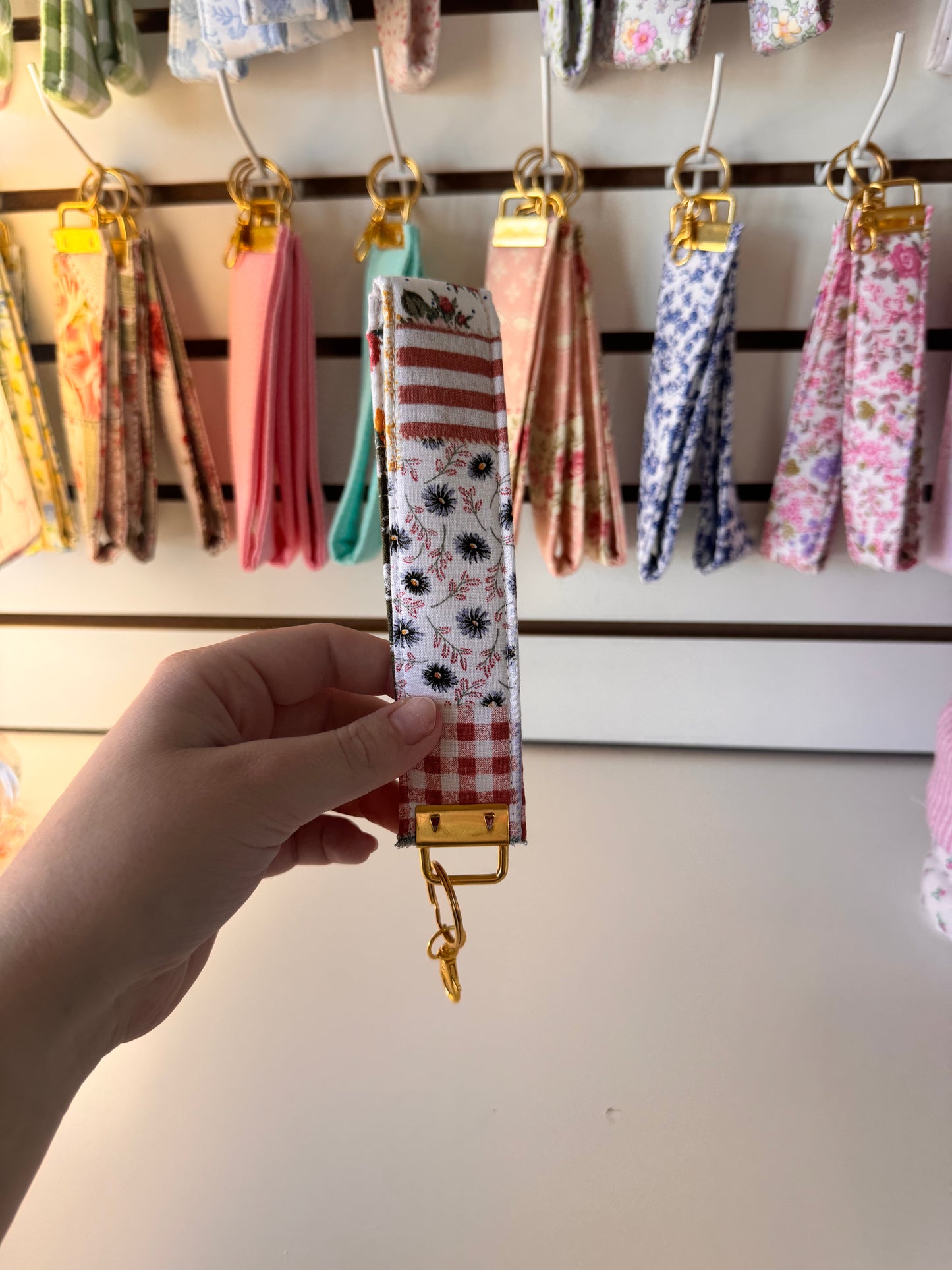 Patchy Floral Wristlet