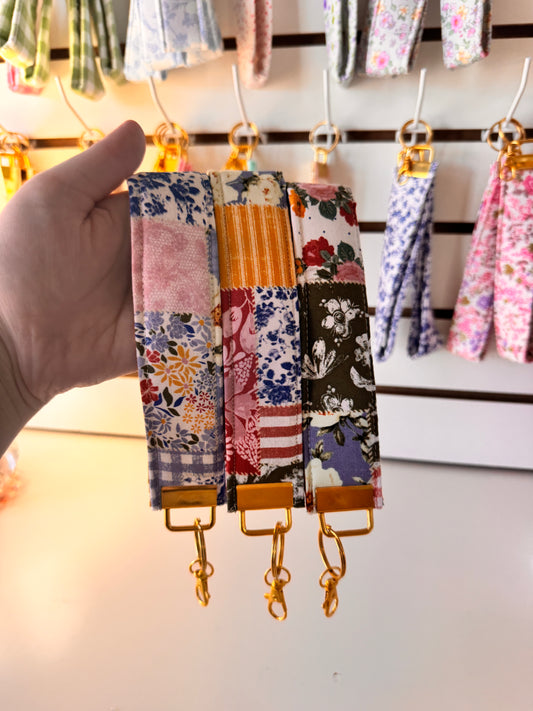 Patchy Floral Wristlet